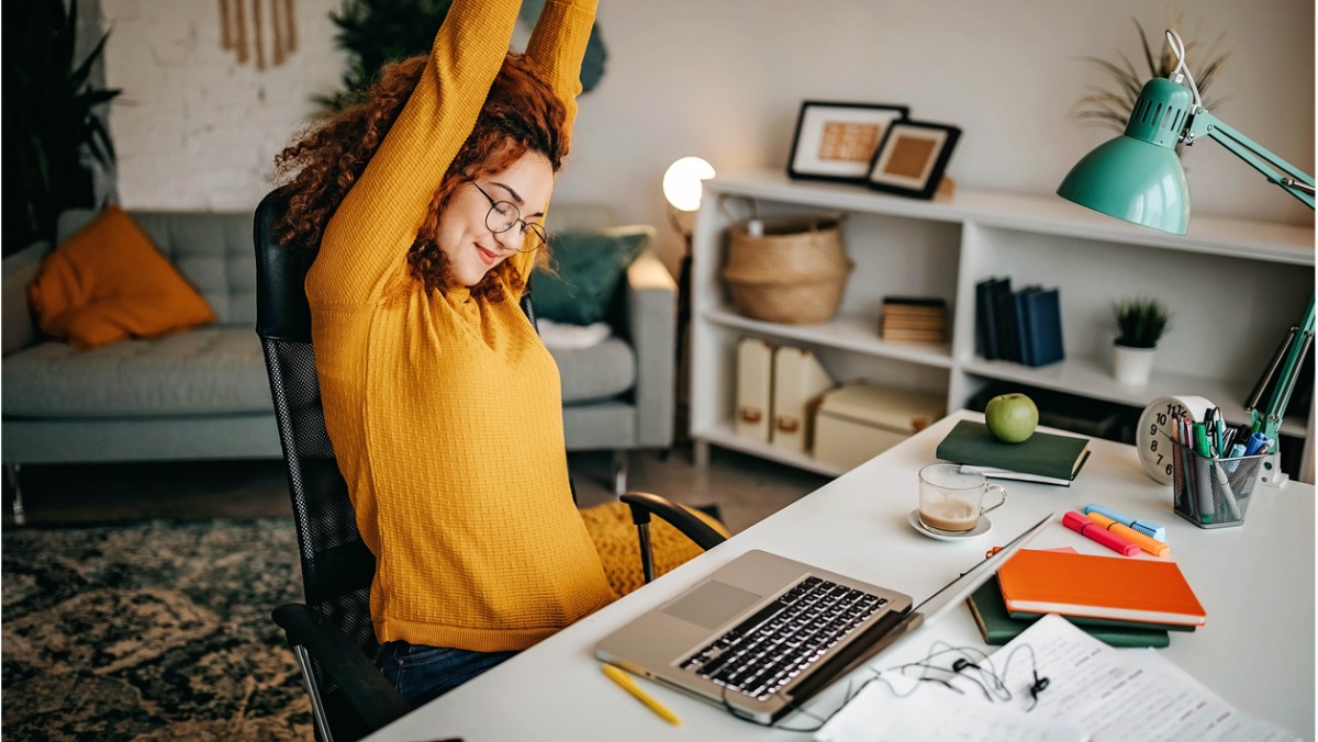 university student has elevated her study desk for an ergonomic one