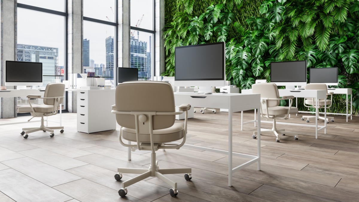 A professional and fun looking office space transformed with featured wall plants.